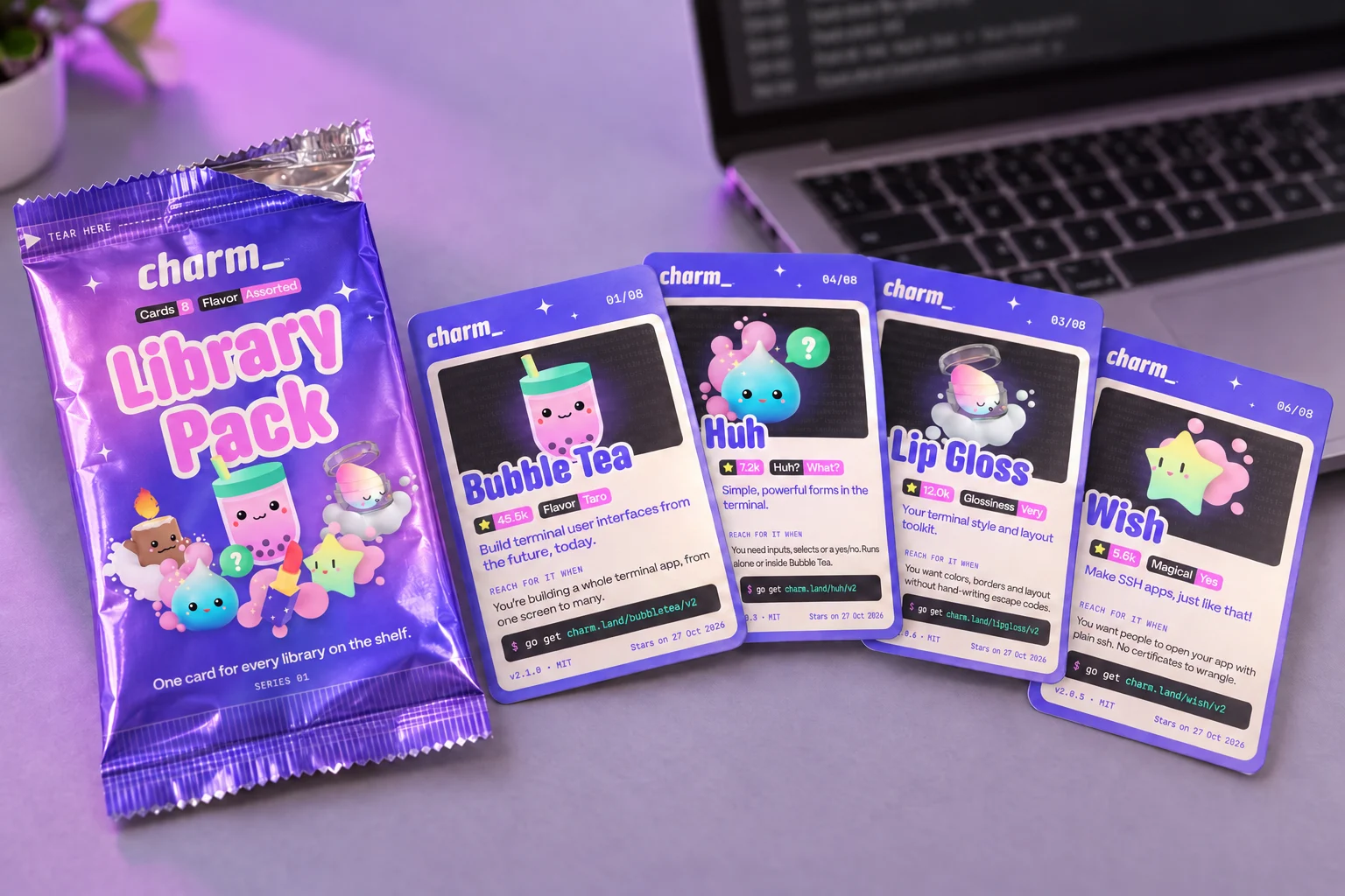 Pack photo: The opened pack and 4 cards on a desk.