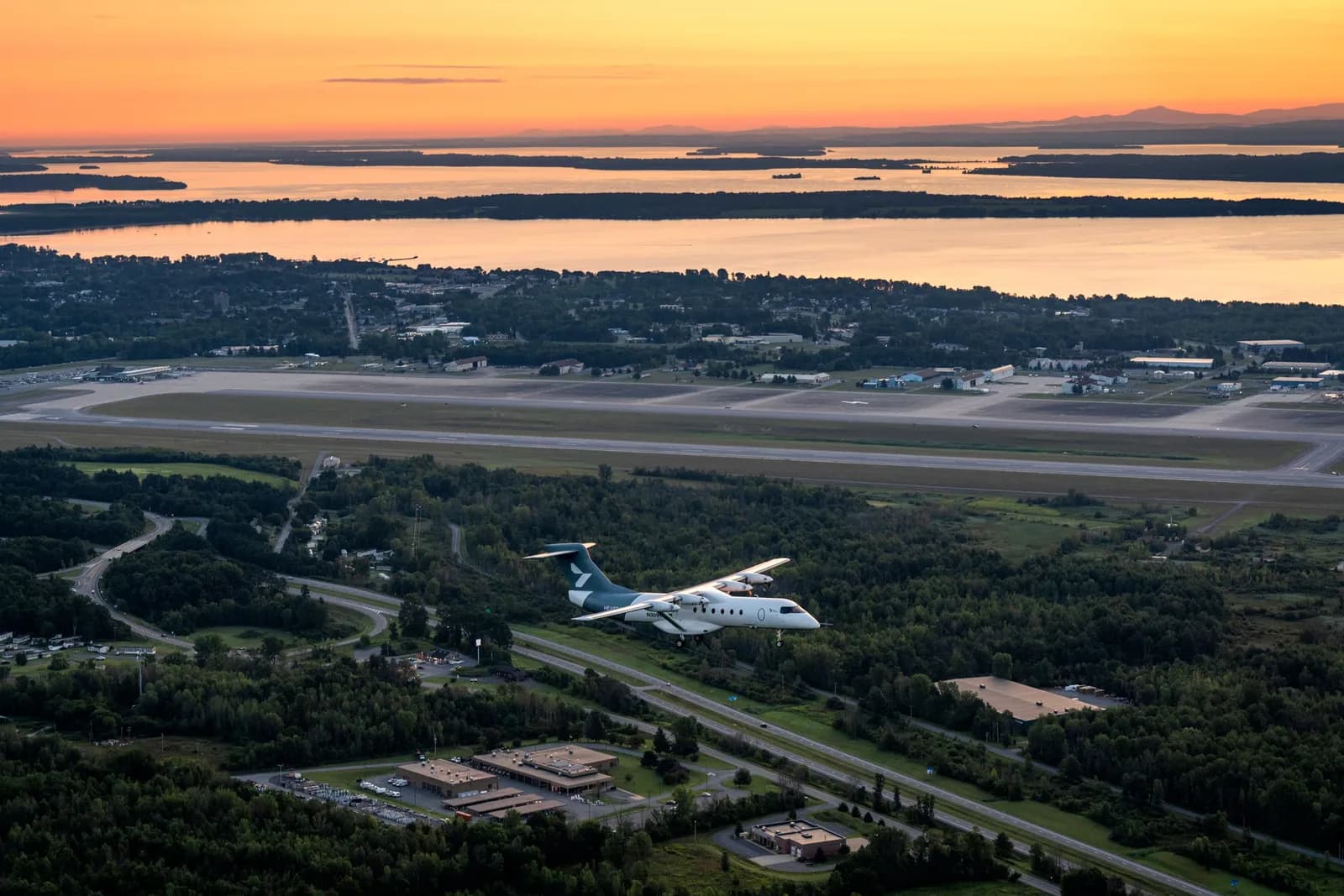 Heart Aerospace brand image: X1 above Plattsburgh at sunrise
