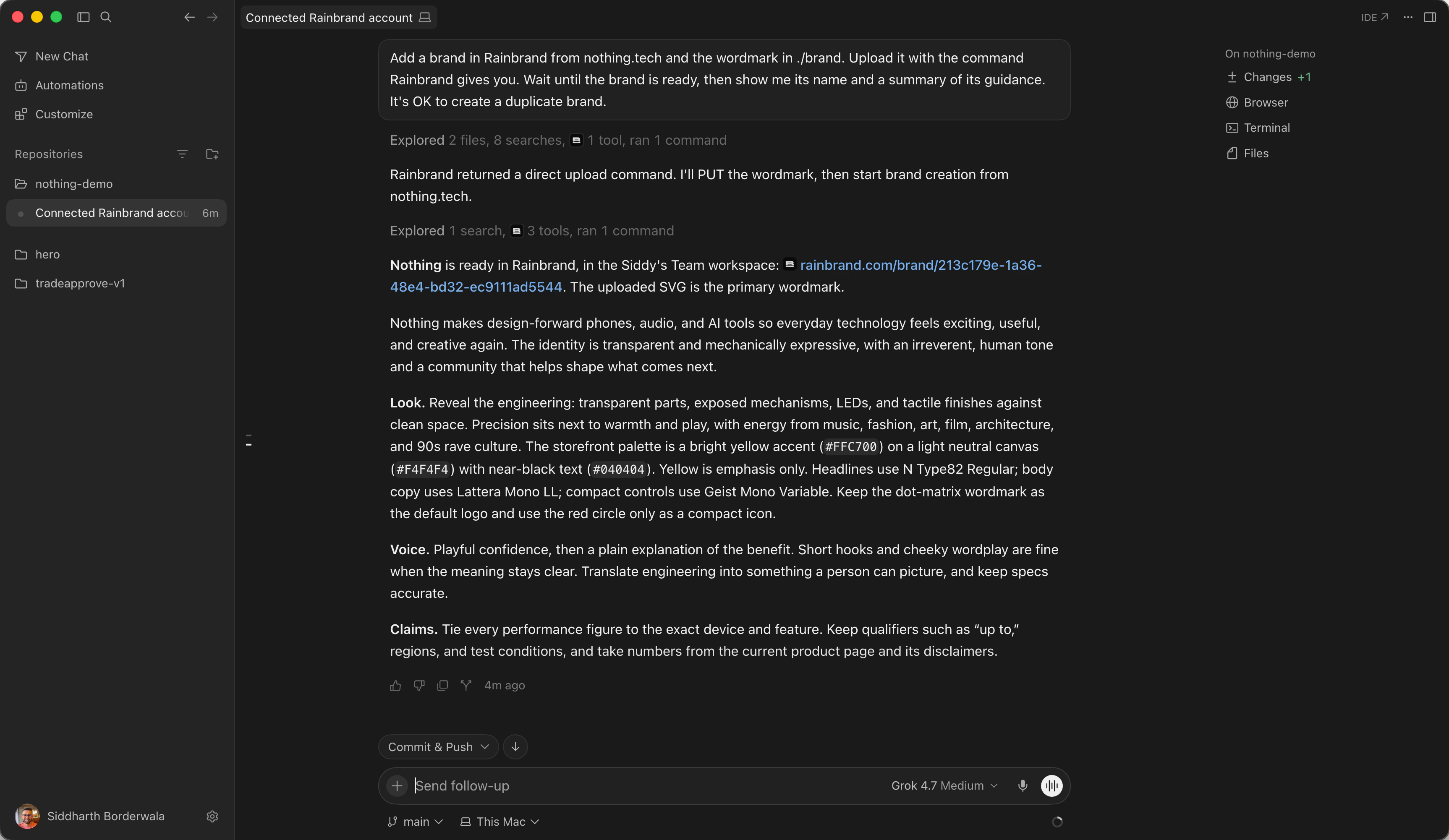 Cursor's Agent reporting that the Nothing brand is ready in Rainbrand, with a summary of its look, voice and claims
