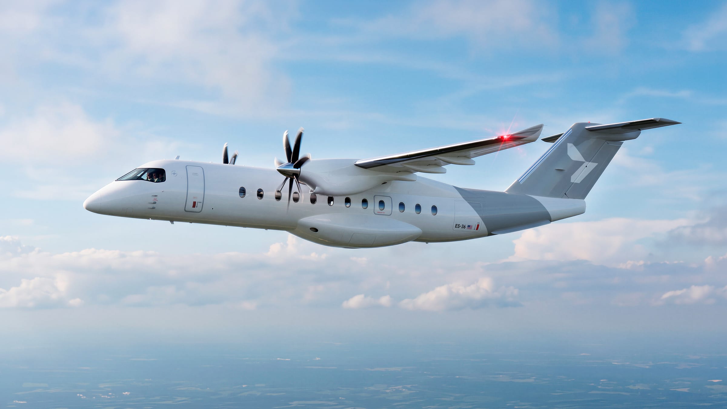 Heart Aerospace’s ES-36 in flight above the clouds.